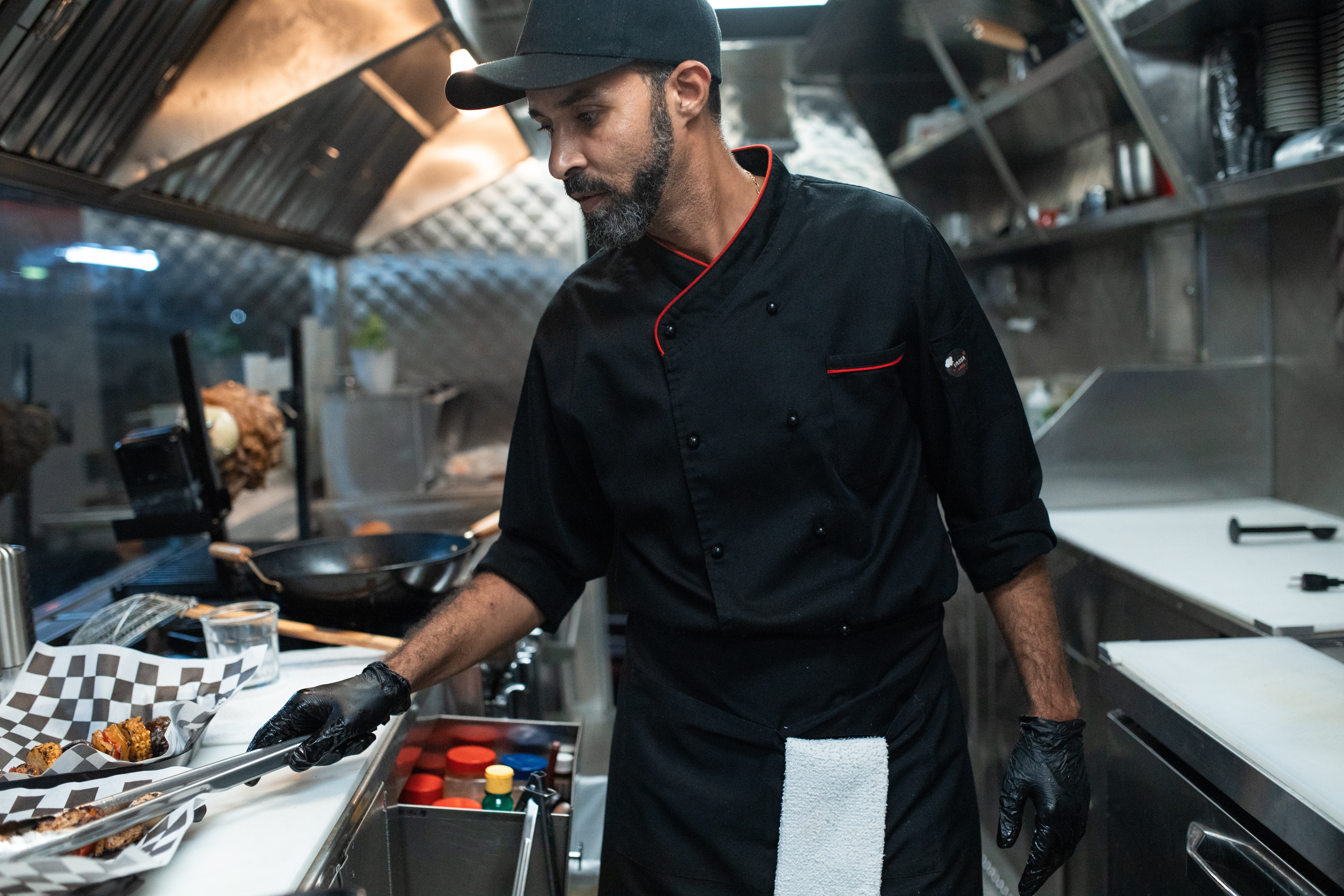 Chef preparing food truck orders